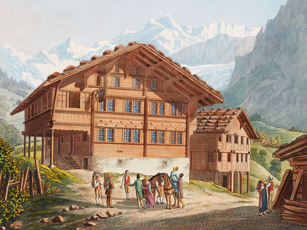 Gasthof in Grindelwald. Im Vordergrund eine Reisegruppe, im Hintergrund Gebirge.